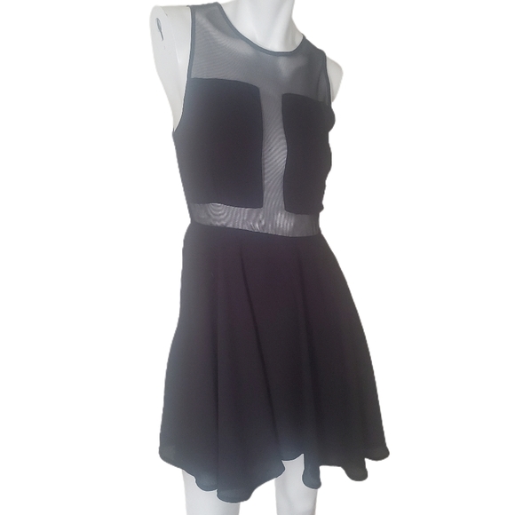 Donna Mizani Dresses & Skirts - Donna Mizani black cutout dress